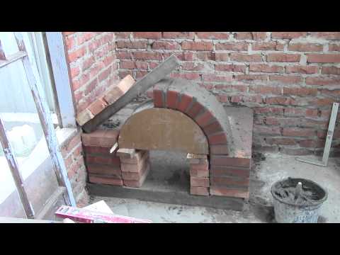 Видео: 07 Русская печка "Дачная Манюня" 0,8 м.кв. Строим арку дровника.