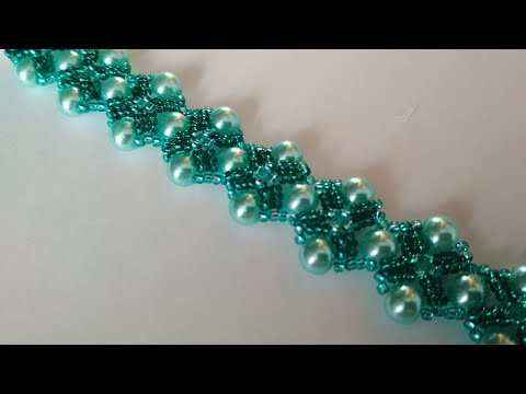 Видео: Green bracelet. DIY. Красивый браслет из бисера и бусин. МК