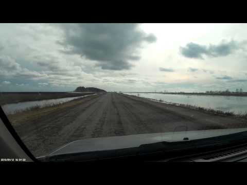 Видео: Вода через трассу Знаменка-Славгород