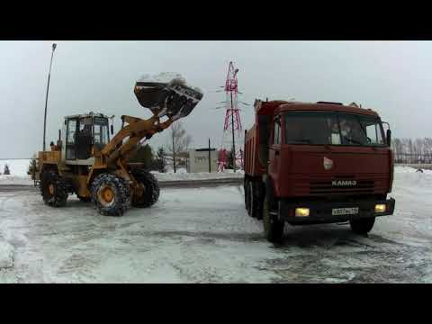 Видео: Амкодор. Погрузка снега и вывоз