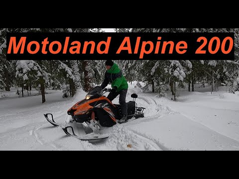 Видео: Снегоход Motoland Alpine 200. Обзор. Тест в глубоком снегу.