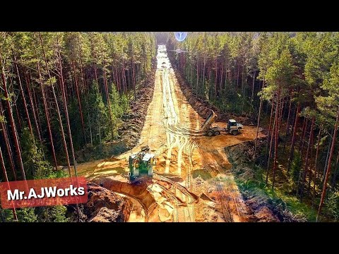 Видео: Опять на залитую водой дорогу - рыть водосточные канавы:Часть 2