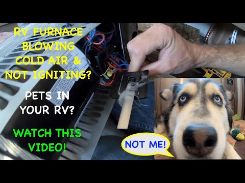 Видео: Печь автодома дует холодным воздухом и не заводится? Снятие печи и ремонт выключателя