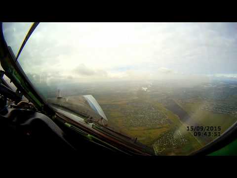 Видео: Омск, посадка из кабины самолета