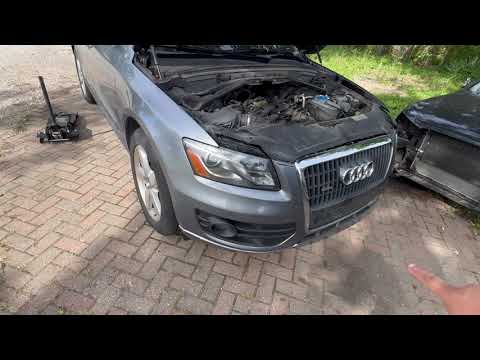 Видео: Снятие и удаление накладки переднего бампера Audi Q5 09-17