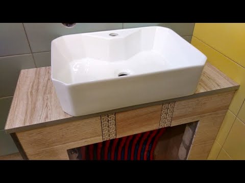 Видео: Каменный подиум и столешница из плитки под установку раковины