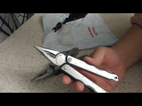 Видео: Открываем посылку - Мультитул Leatherman KICK