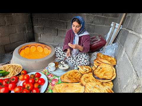 Видео: 18-летняя азербайджанская девушка за один день приготовила в тандыре 25 лавашей и еды