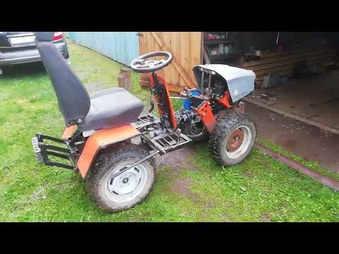 Видео: мотоблок с адаптером переломкой и механизмом поднятия навески