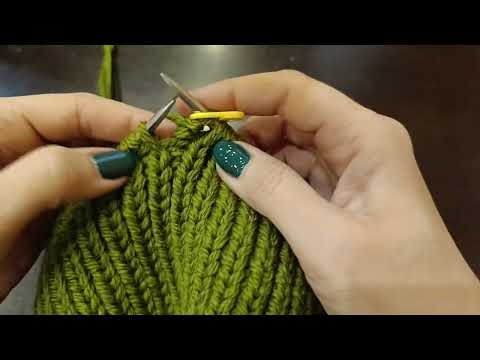 Видео: Фиксированный отворот на шапке спицами, резинка 1*1