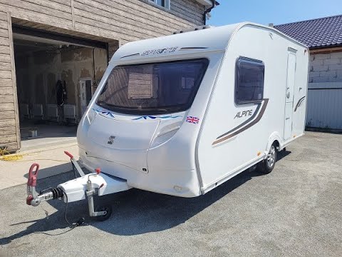 Видео: ОБЗОР КОМПАКТНОГО КАРАВАНА SPRITE ALPINE 2011 г