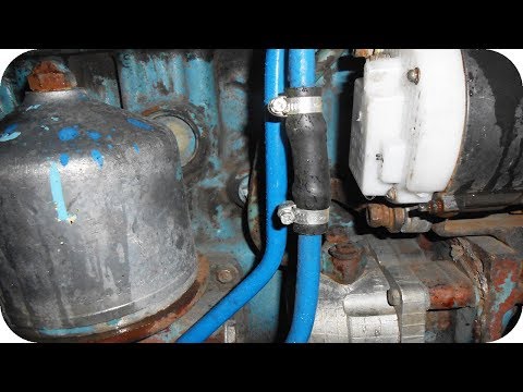 Видео: Ремонт трактора МТЗ Трубка масляного радіатора
