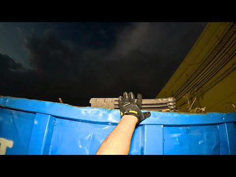 Видео: Ныряние в мусорном контейнере. «Видите всю резкость?»