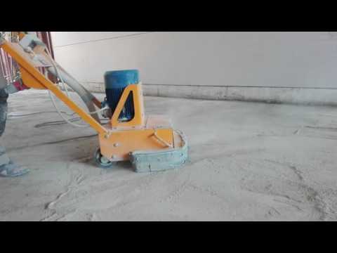 Видео: Шлифуется старый бетон в паркинге алмазными франкфуртами.