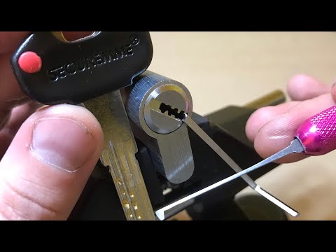 Видео: (25)Вскрыть замок секурема К-2 двухрядная 10 пинов.Securemma. Москва и Подмосковье..+79161483868