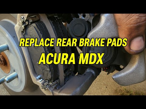 Видео: Замена задних тормозных колодок Acura MDX