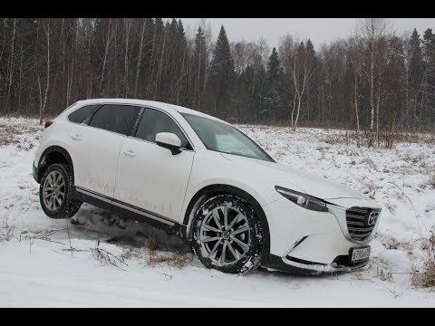 Видео: Мазда СХ 9 (Mazda CX 9): укротитель городских сугробов