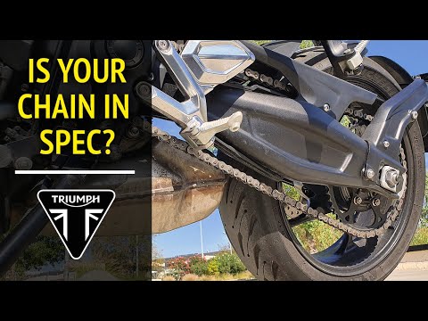 Видео: Triumph Trident 660 — правильное натяжение цепи мотоцикла