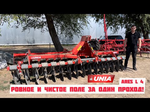 Видео: Дисковый мульчировщик Ares, видео в работе с МТЗ1221. Дискование пшеницы перед посевом рапса.