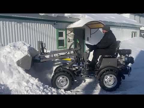 Видео: Уборка снега мини-погрузчиком