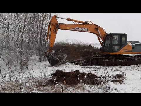 Видео: расчистка  поля экскаватором