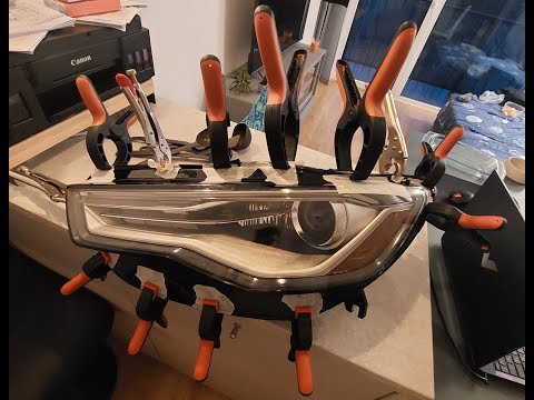 Видео: Ремонт передней фары Audi a6c7, замена разбитого стекла