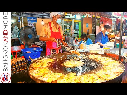 Видео: Ночной рынок и уличная еда в Бангкоке Талад Пхлу