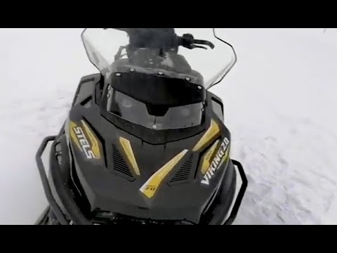 Видео: Скребки для охлаждения склизов снегохода. Как ведет себя снегоход в процессе обкатки. STELS VIKING.