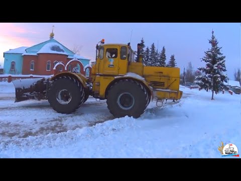 Видео: Расчистка снега на Т-150К и К-701. Очередной день "Из жизни коммунала".