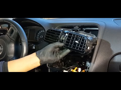 Видео: Снятие магнитолы и центральной решетки дефлектора приборной панели VW Polo