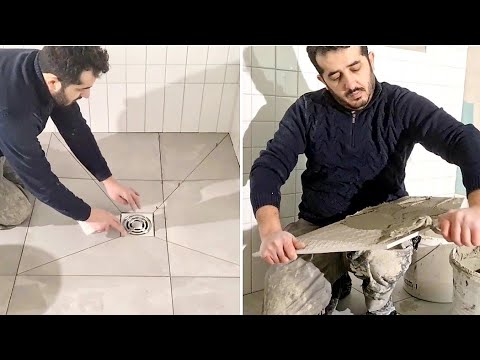 Видео: напольная плитка для ванной от А до Я | Утепление и укладка керамической плитки 60х60 см.