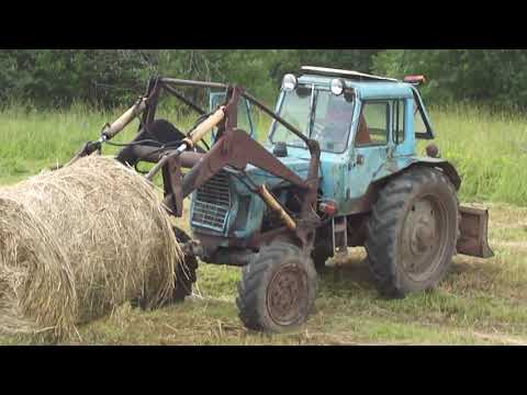 Видео: ВЫВОЗИМ СЕНО С ПОЛЯ НА 2 МТЗ С ТРЕМЯ ТЕЛЕГАМИ