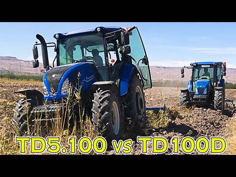 Видео: Тракторы TD5.100 и TD100 New Holland вспахивают и сравнивают