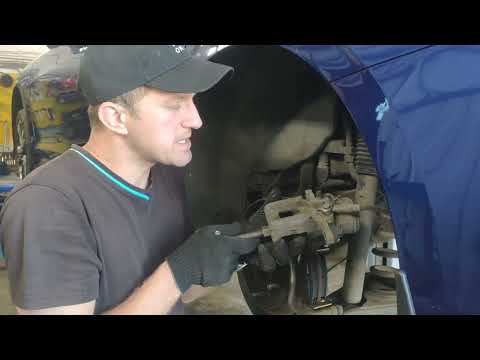 Видео: Kia К5 . Замена задних тормозных колодок,без диагностического оборудования.