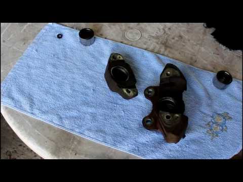 Видео: Переборка задних тормозных суппортов на Land Rover Defender Ленд Ровер Дефендер 2005 года