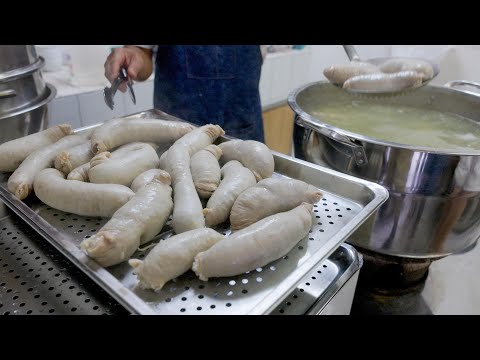 Видео: Мастер по приготовлению клейкой рисовой колбасы ручной работы, курица, тушеная в травяном супе