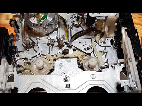 Видео: Как достать застрявшую видеокассету из видеоплеера Panasonic SR50 Часть - 1