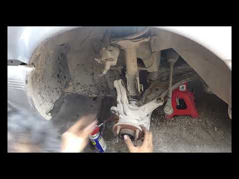 Видео: Как самостоятельно поменять ступичный подшипник на моем автомобиле