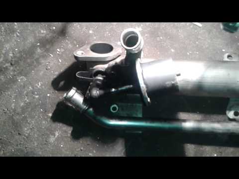 Видео: Замена радиатора охлаждения ОГ