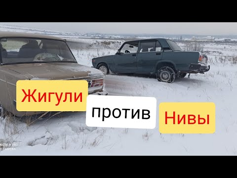 Видео: ВАЗ 2107 против Нивы в снежном поле Минусинска.