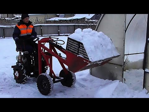 Видео: Уборка снега минипогрузчиком на мотоблоке МТЗ 09Н