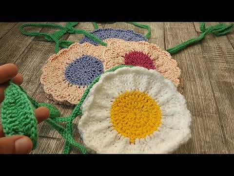 Видео: Детские сумочки цветочки крючком