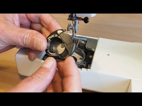Видео: Снятие и установка шпульного колпачка