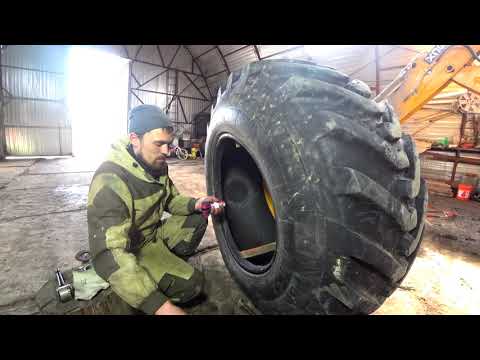 Видео: Эпичный ремонт колеса! Трактор экскаватор погрузчик. Порвалось колесо.