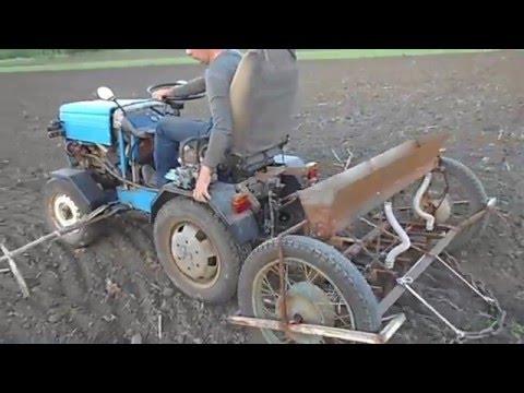 Видео: Минитрактор Мультик Посев кукурузы1
