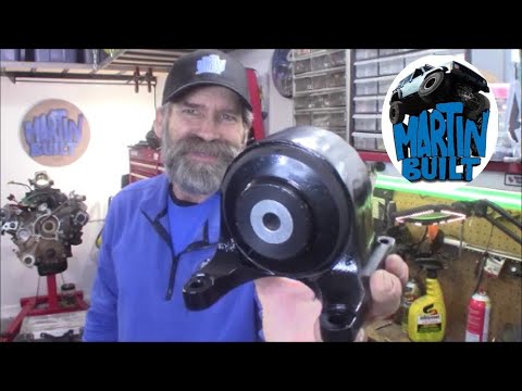 Видео: Как заменить опору коробки передач на Jeep Grand Cherokee 99-04 годов выпуска