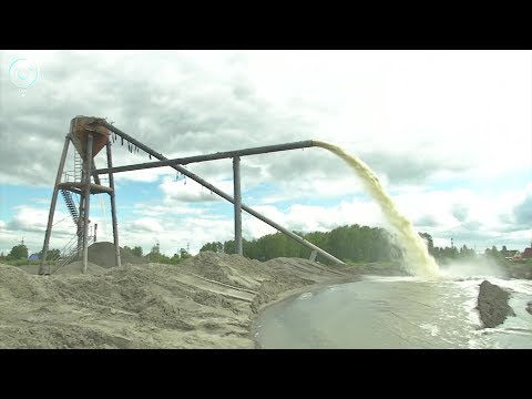Видео: В Новосибирске начали разрабатывать новый карьер. По какой технологии добывают песок из болота?