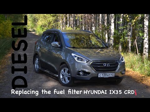 Видео: Замена дизельного топливного фильтра HYUNDAI IX35 CRDi. Replacing the fuel filter.