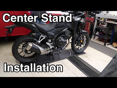Видео: Простые шаги по установке центральной подставки на ваш Honda Nx 500!