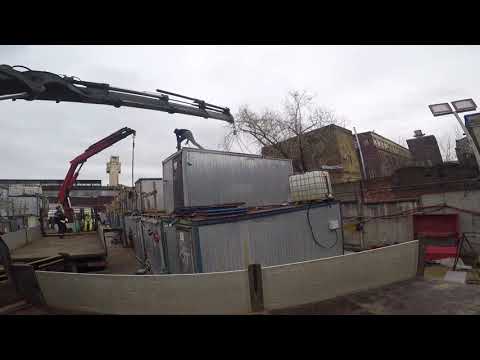 Видео: Кран манипулятор.Правильная погрузка бытовок,двумя кранами одновременно.